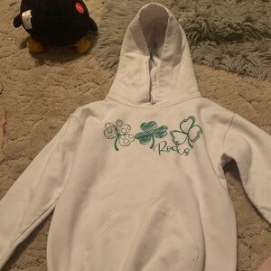 Kids White Hoodie with Green Clover Graphic - Rocks